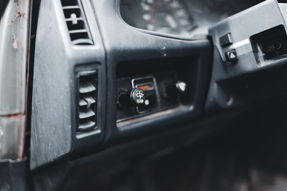 A close detail of a well-used vehicle interior